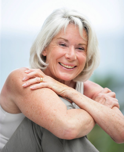 woman smiling showing how effective senior dental care can be